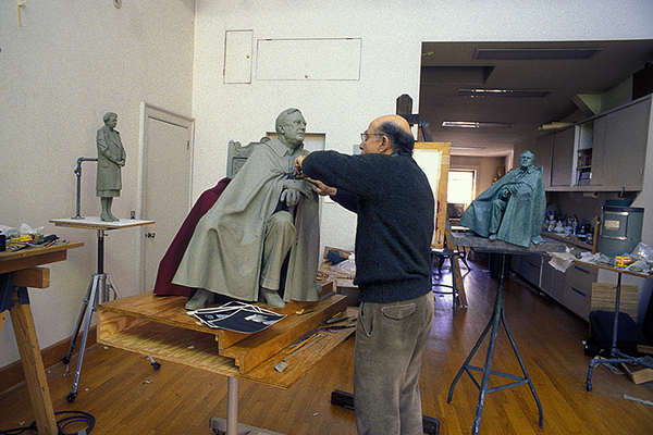 Neil Estern shapes drape of cape on scale model : Shaping A President : Diane Smook Photography: Nature, Dance, Documentary